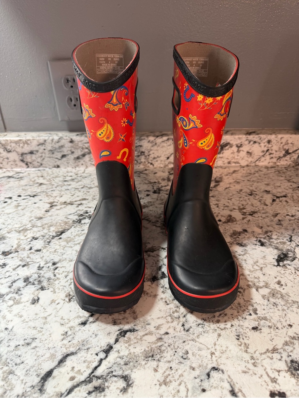BOGS Kids Rain Boot Western in a red multi-color paisley pattern.
